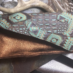 Super fun and wild metallic leather clutch bag, inside is rough side leather with one perfectly sized credit card pocket, clutch bag