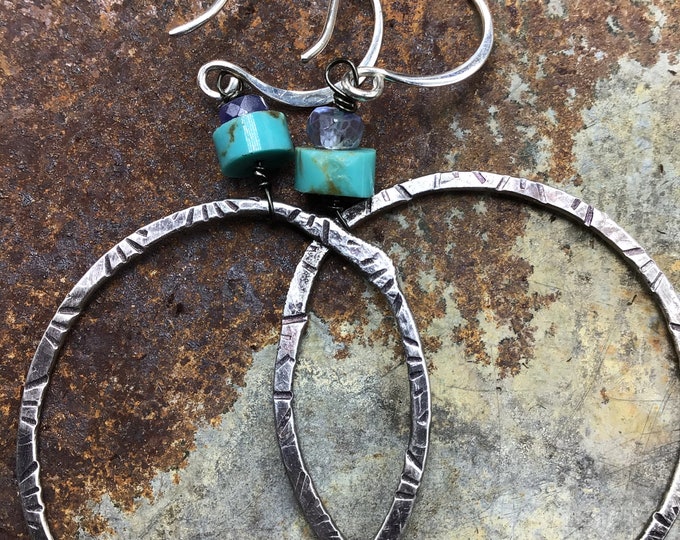 Large hoops with sterling ear wIres  and light starburst embossing around hoops by Weathered Soul