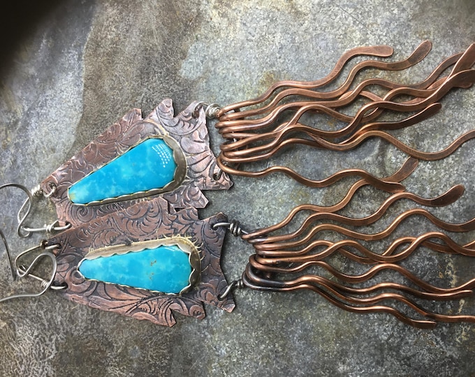 You look good in them baby blues earrings by Weathered Soul old school Kingman turquoise brilliant teal blue on Aztec arrow embossed copper