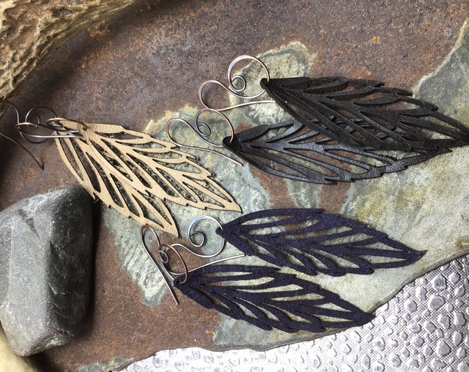 Light as a feather for Fall leather feather earrings with swirling ear wires, urban chic
