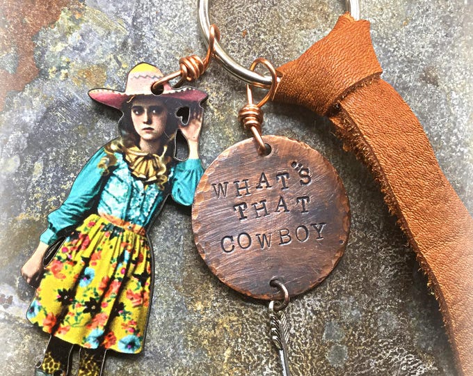 Cowgirl keychain by Weathered Soul, they all have a character of their own, like cowgirls do! Wood cut out with leather and charms