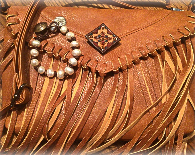 Faux leather boho fringe saddle tan purse with artisan leather handmade brooch on flap for just a fun touch of color, boho western