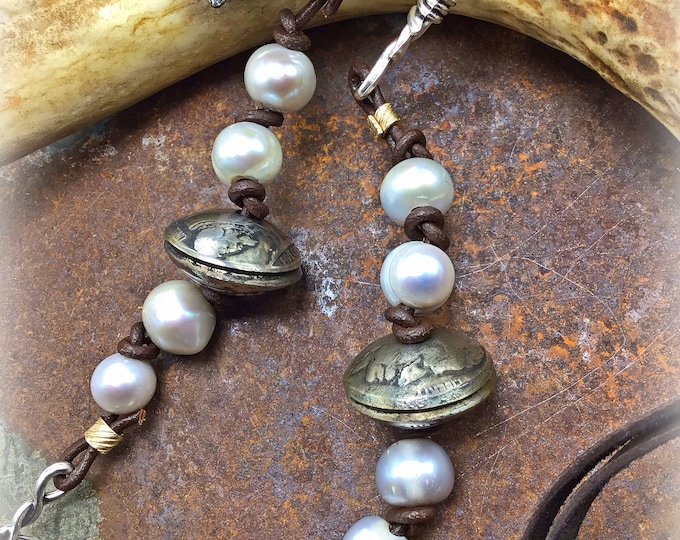Just about as fantastically western as it gets vintage buffalo nickels with leather pearls and barbed wire necklace by Weathered soul