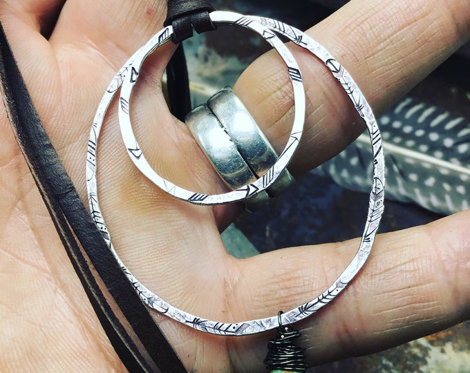 Going Full Circle Necklace by Weathered Soul Jewelry, hammered embossed feathers and arrows on two sterling rustic hoops with leather, USA