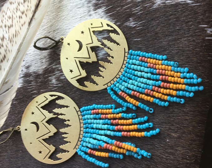 Mountains enclosed bronze cut out scene with beautiful beaded patterned fringe dangles with bronze ear wires by Weathered Soul jewelry