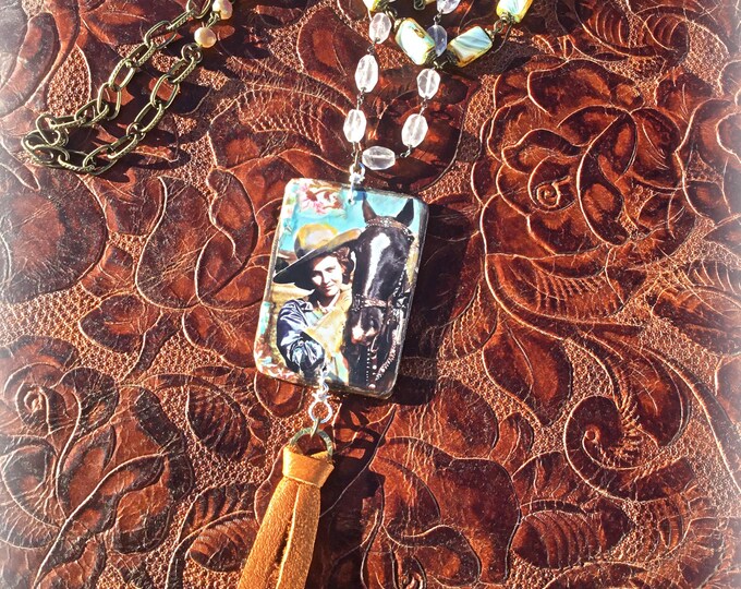 Vintage Rose Cowgirl necklace with layers of rose quartz vintage inspired rosary chain and bronze with fun leather tassel long style