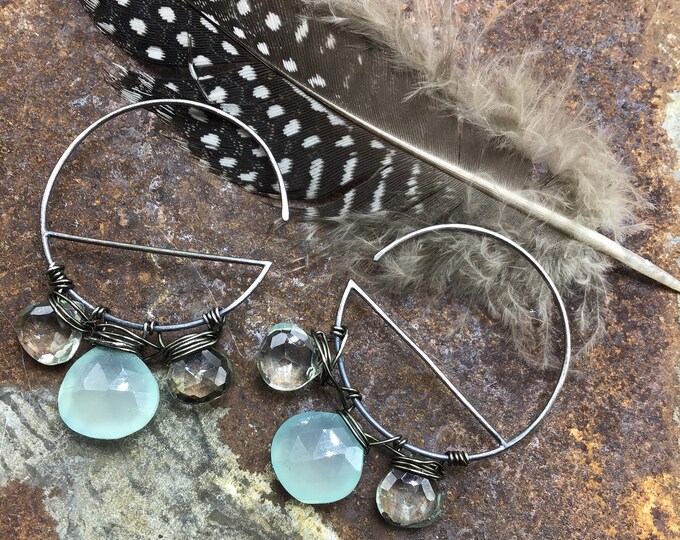 Sweet little through the ear sterling half hoops with topaz and sea blue chalcedony wire wrapped around bottom for a shimmer