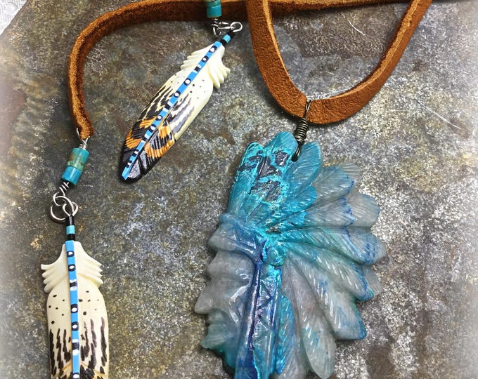 Carved Chrysocolla stone with incredible chalcedony and Elk leather with hand painted bone feathers at ends for wrap and tie look.