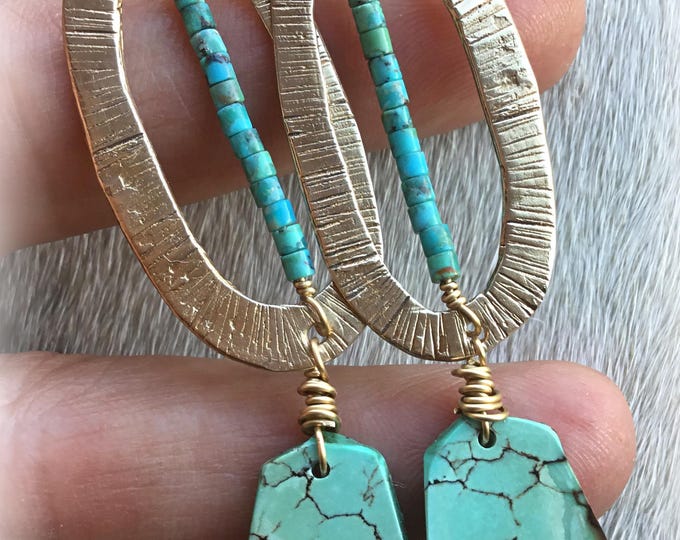 Large oval bronze textured hoops with dainty turquoise up the center and raw slab drop below by Weathered Soul urban cowgirl night