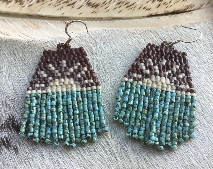 Earthy fun little sunrise earrings with soft muted brown and turquoise toned seed beads with sterling ear wires,urban cowgirl vibe! Love!