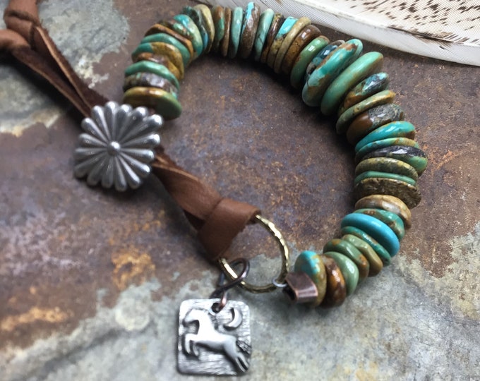 Genuine turquoise chunky bracelet with leather and western concho button closure with elk leather and jumping pony charm, cowgirl style
