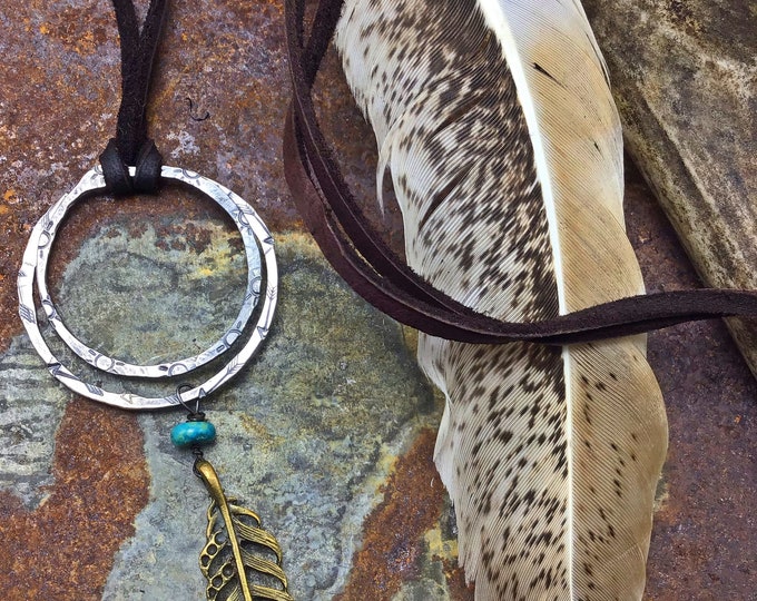 Rising sun,arrows, and feather necklace by Weathered Soul jewelry, artisan embossed sterling hoops, leather over head style, cowgirl