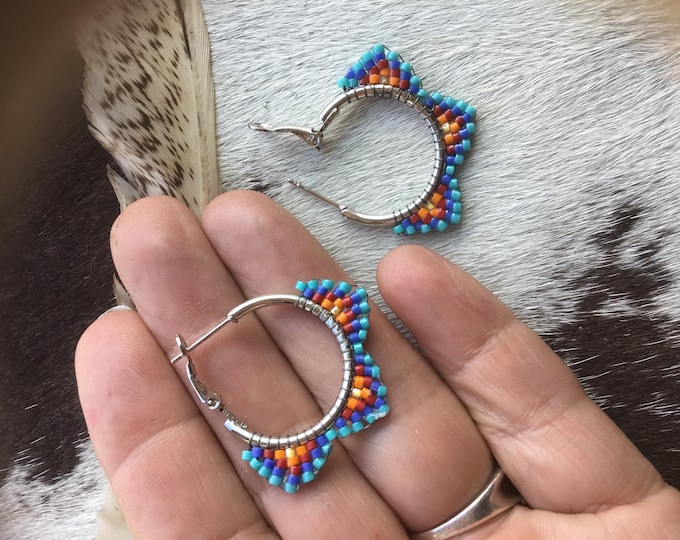 Sweet through the ear silver beaded hoops with lever back style closures. Medium hoops by Weathered Soul Jewelry, western fashion