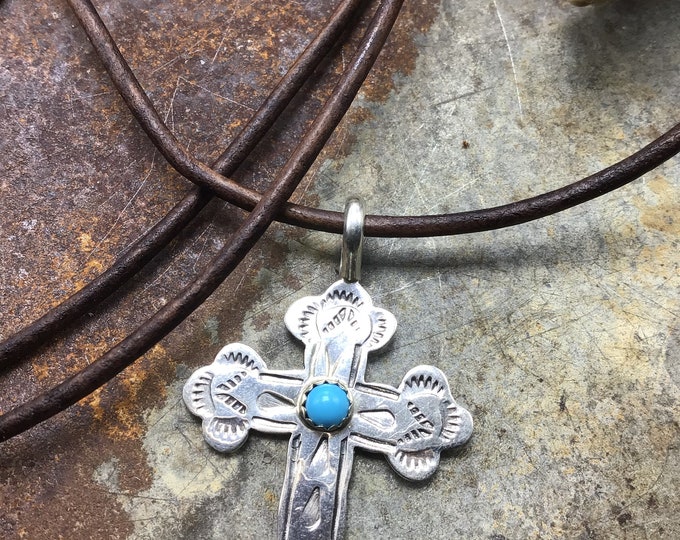 Sweet sterling stamped rugged cross with a touch of turquoise on leather cord with longhorn button closure necklace by Weathered Soul