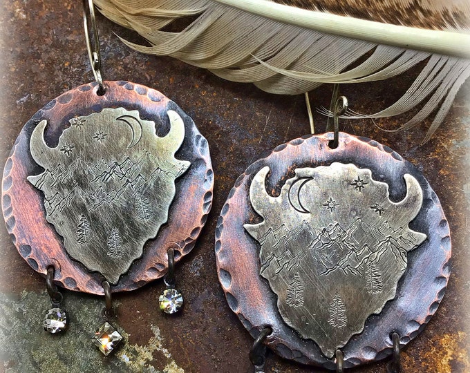 The great bison earrings with mountain scenery inside sillouette in rustic copper medallions with rhinestone drops
