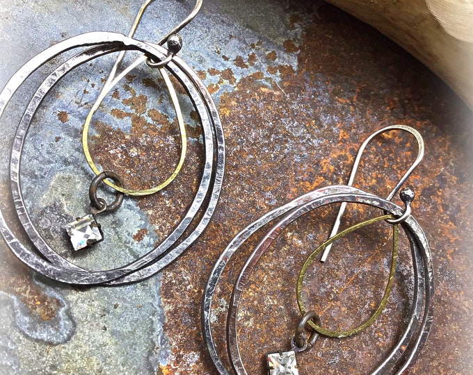 Very rustic organic urban vibe with these nice sized hammered sterling hoops with bronze and a touch of rhinestone, sterling ear wires