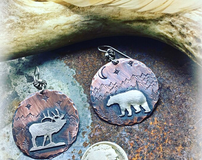 Walking bear and talking elk earrings by Weathered soul, sterling silver elk and bear on rustic mountain stamped copper discs, silver wires