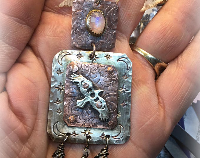 Made to Order Raven in flight earrings with flashy moonstone with bezel set moonstone on tooled rustic copper on silver ball ear wires