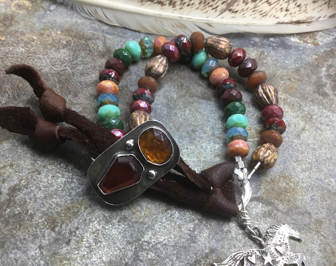 Stunning fire polished double layer Swarovski crystal beads with running horse and artisan button in sterling closure with leather wrap