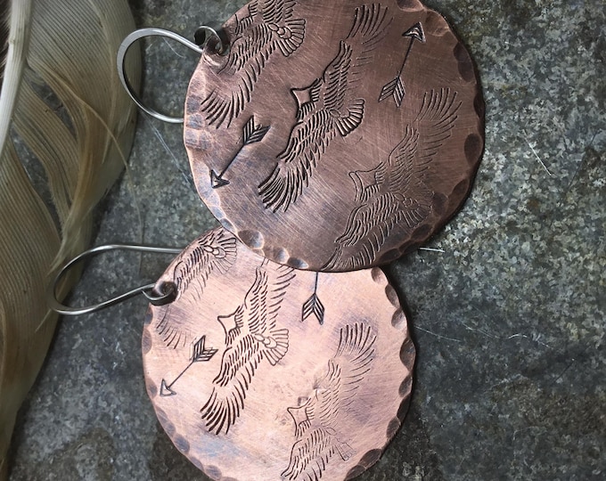 Departing flying raven copper medallion earrings by Weathered Soul,approximately 1.25” discs with sterling ear wires