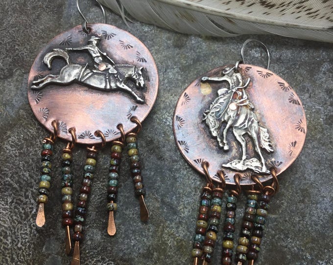 Made to order! Let them buck earrings by Weathered Soul bronc earrings with oxidized copper and sterling with a touch of beaded fringe