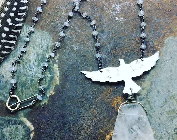 Frost bite necklace by Weathered Soul with Raven and moonstone and a large raw quartz slab