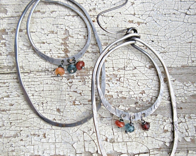 Large double hoop earrings with garnet, blue topaz, and carnelian semi-precious stones by Vintage PonyTM, artisan crafted in the USA