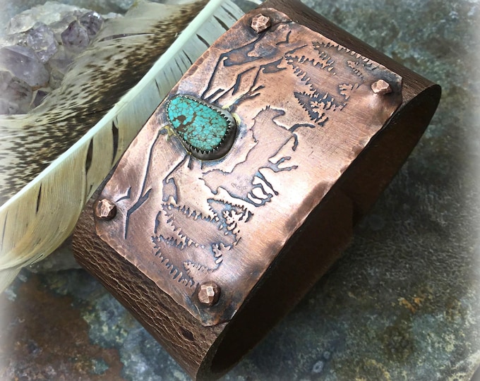 Wide distressed leather and copper cuff bracelet by Weathered Soul with a touch of turquoise with wild horses, mountain scene-snap closure