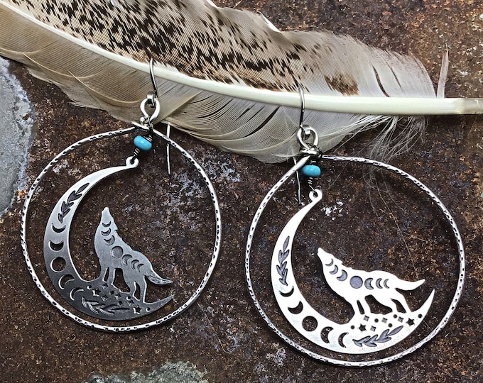 Night howl earrings by Weathered Soul, artisan sterling large hoops with a moving moon and wolf dangling  with a touch of turquoise