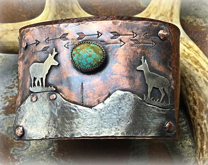 Made to order all a little different because they are totally hand crafted antelope leather sterling and copper cuff bracelet