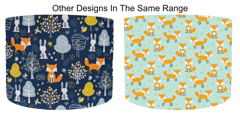 May include: Two fabric designs featuring woodland animals. The first design is a dark blue background with white rabbits, orange foxes, yellow trees, and white birds. The second design is a light blue background with orange foxes.