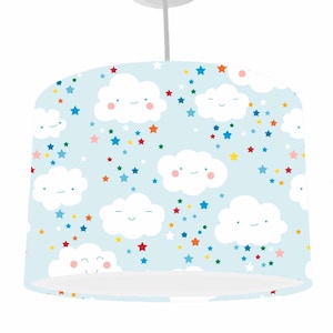 May include: A light blue lampshade featuring a pattern of white clouds and colourful stars. The clouds have smiling faces.