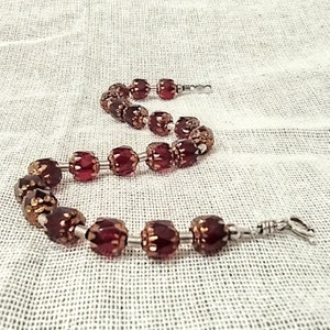 Red Glass and Sterling Silver Beaded Bracelet. Sterling silver bugle beads and round beads. Fancy sparkly, clear, red, glass beads.