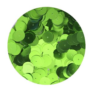May include: A close-up of a pile of lime green sequins. The sequins are round and have a metallic sheen.