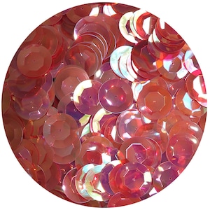 May include: A close-up of a pile of iridescent pink sequins. The sequins are round and have a slightly raised centre. They are perfect for adding a touch of sparkle to any craft project.