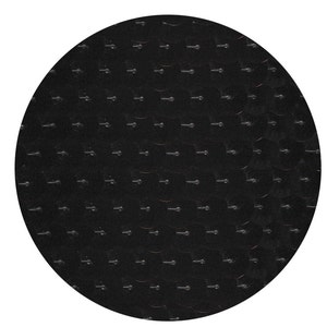 May include: Black round fabric with a repeating pattern of small, raised dots.