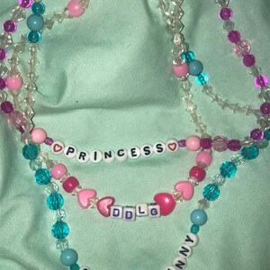 Y2K late 90s plastic crystal word choker choice princess snowbunny ddlg