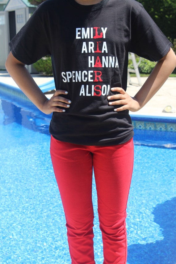 white t shirt with red writing