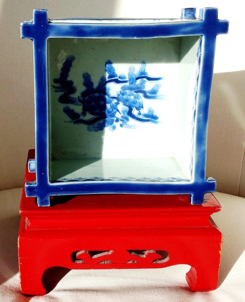 Oriental vase with blue and white square porcelain clay turtle design