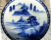 White blue Japanese plate with 20th century oriental landscape Japanese charger Arita Imari signed by print in porcelain