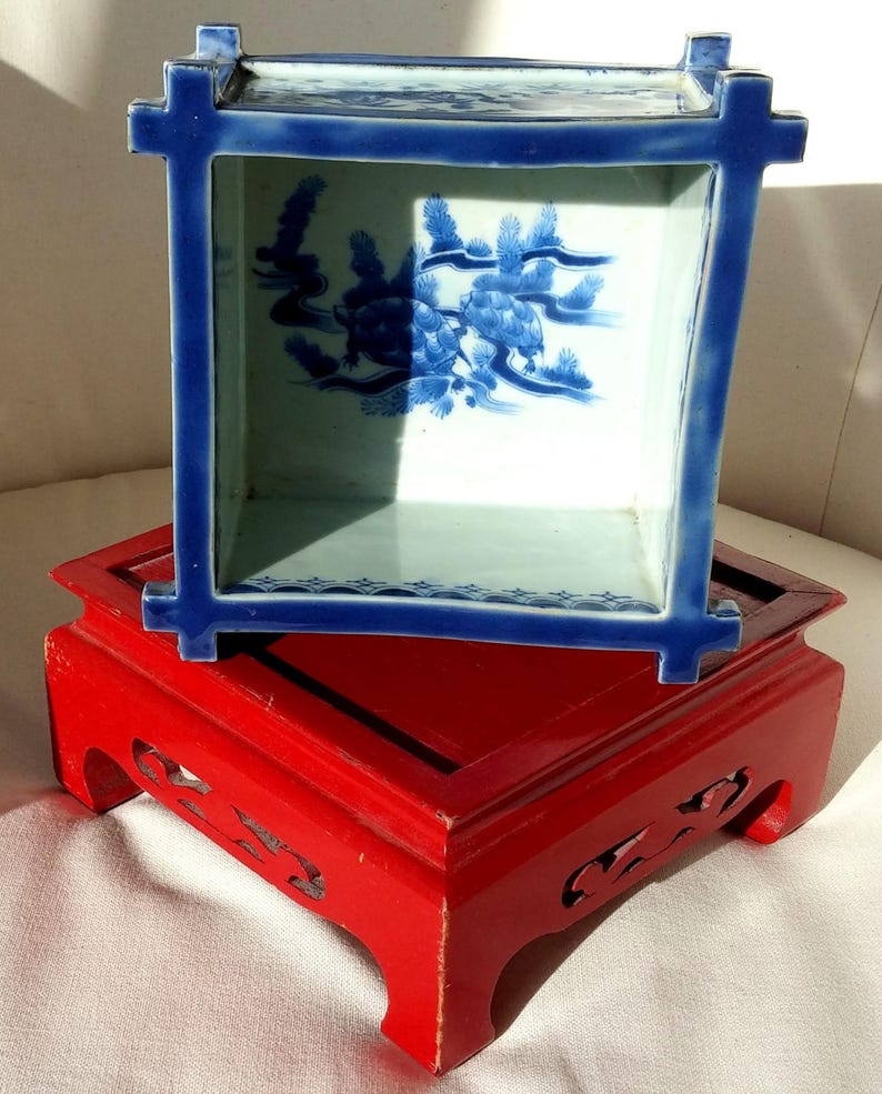 Oriental vase with blue and white square porcelain clay turtle design