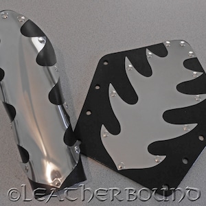 Metal Flame and leather Bracers. 24 gage stainlees steel. Special!