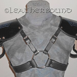 Leather Pauldrens in Black with Hand Carved Celtic Knot images dyed Blue and Piped Edges