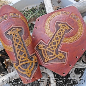 Leather Norse Bracers fully Tooled with a Thor&#39;s Hammer and torque Images.