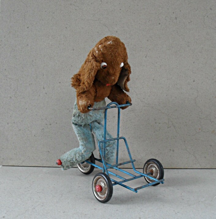 Vintage dog on bicycle push toy animal on wheels pedaling Etsy
