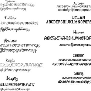 May include: A selection of name designs in different fonts. Names include Jasmine, Natasha, Hanna, Kayla, Honey, Aubrey, Dylan, Hudson, Corbin, and Robert. Each name is shown with upper and lower case alphabets.