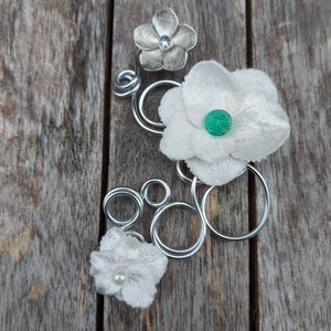 Modern silver wire wedding buttonhole corsage