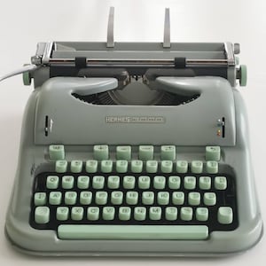Hermes 3000 Portable Typewriter in great working condition with matching original hard case, Switzerland (c. 1950)