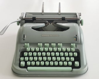 Hermes 3000 Portable Typewriter in great working condition with matching original hard case, Switzerland (c. 1950)