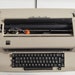 IBM Selectric II Golf ball vintage electric typewriter in original grey color with 8 extra type balls, Switzerland c. 1970 image 6